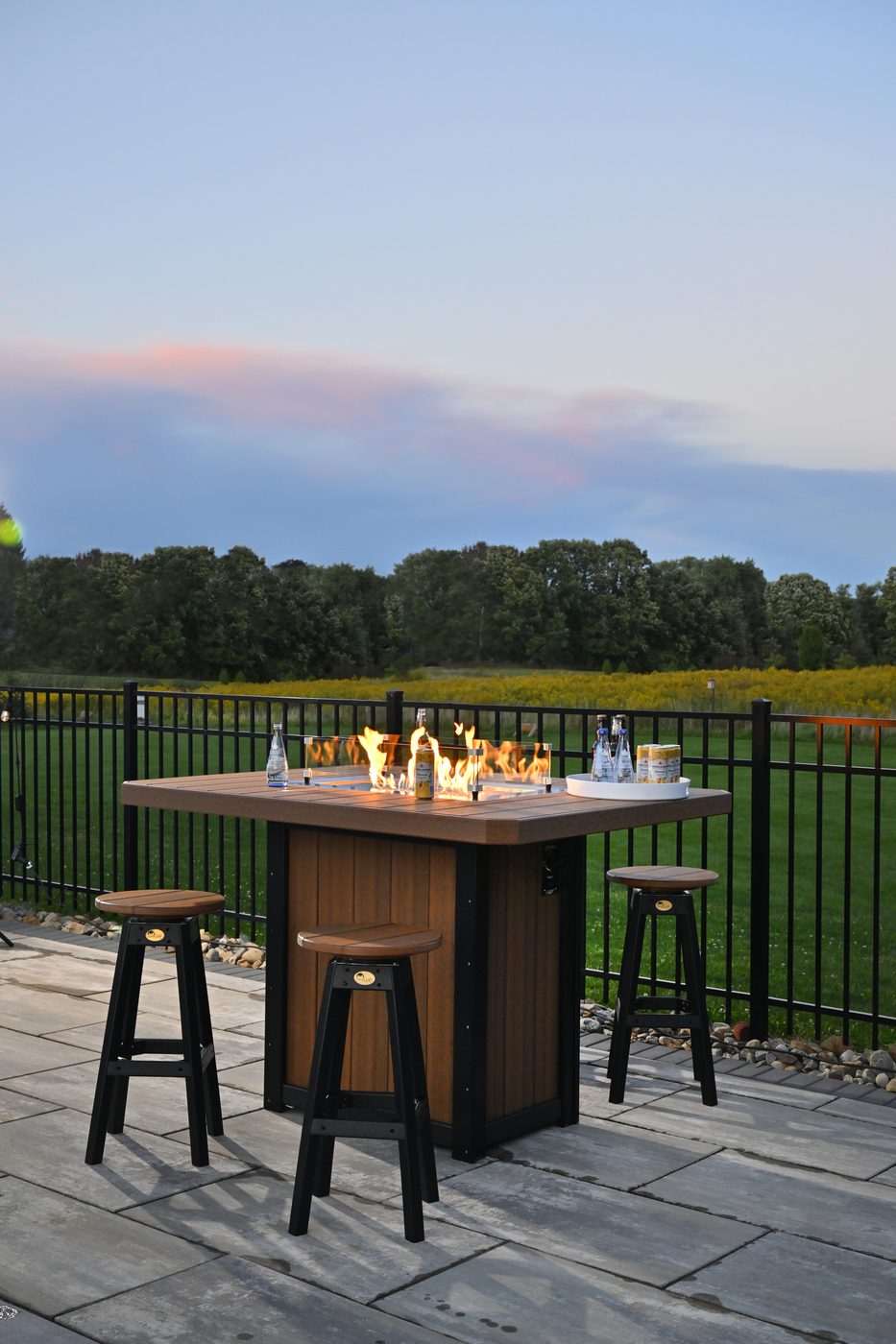 LuxCraft Lumin fire table on a patio
