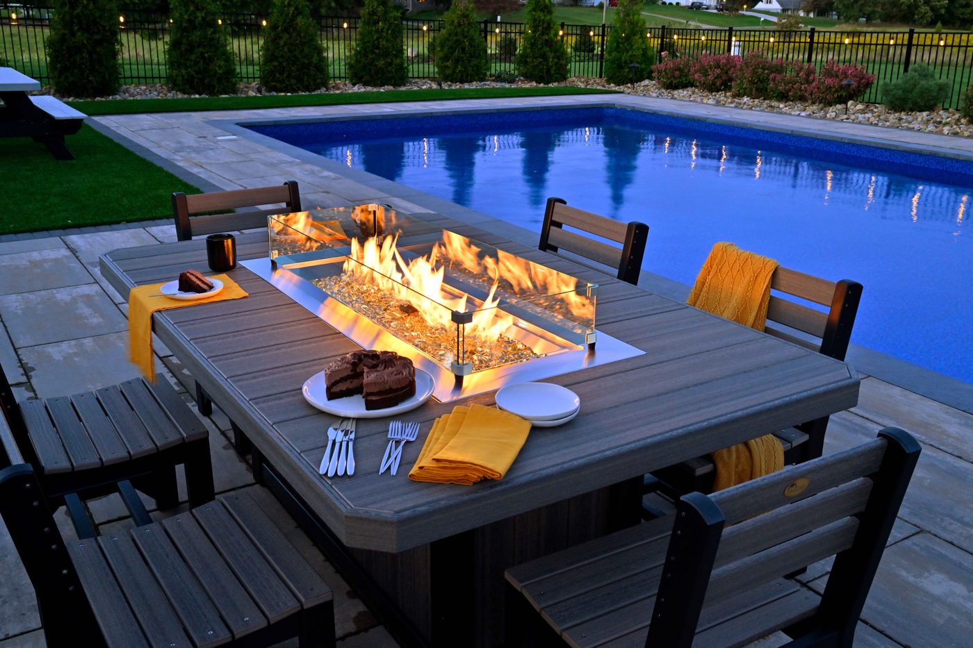 LuxCraft Lumin fire table on a patio