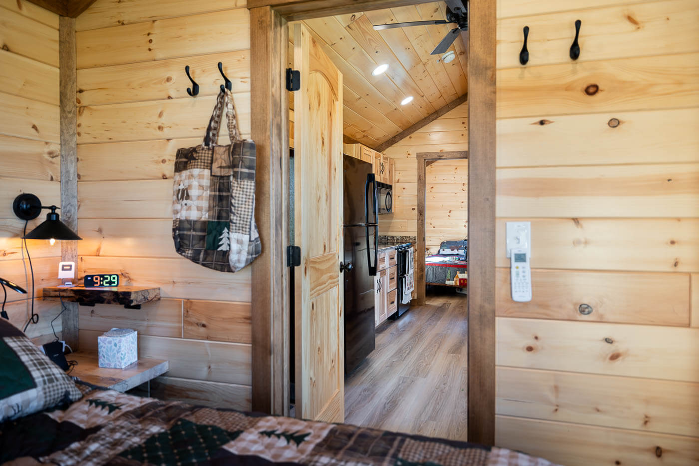 View from one bedroom through the kitchen to the other