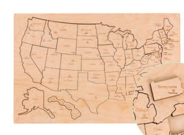 Wooden United States puzzle with engraved state pieces
