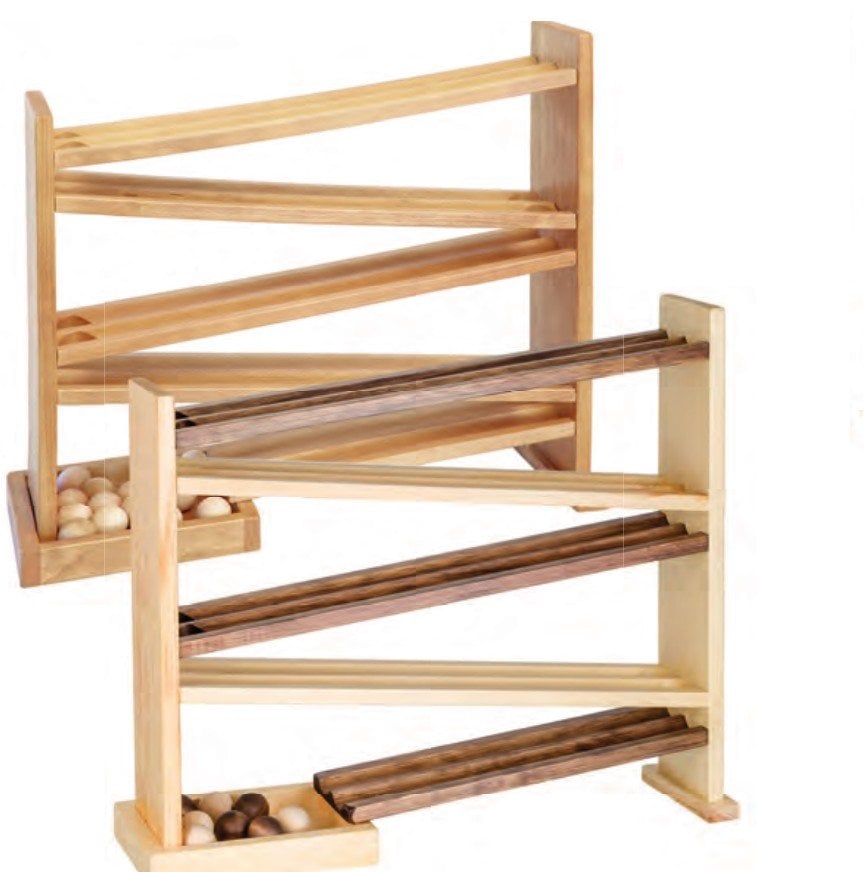 Two wooden ball roller racetracks with wooden balls