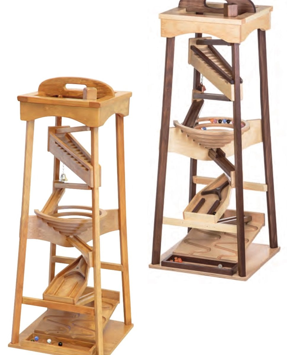 Two wooden marble pyramids in harvest and walnut